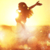 Creative Brand Land- Color Psychology- Yellow-Young woman on field under sunset light